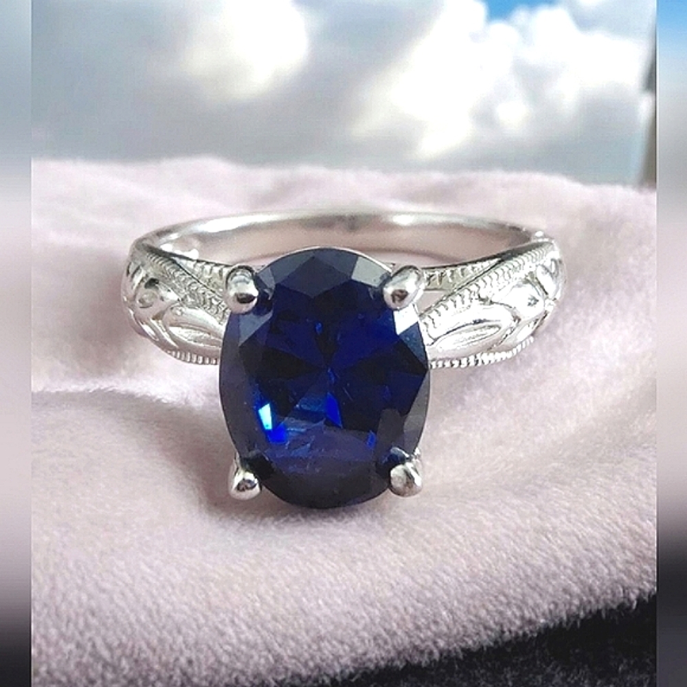 PAJ Signed Sterling Silver Ring with Deep Blue Oval Stone & Engraved Band